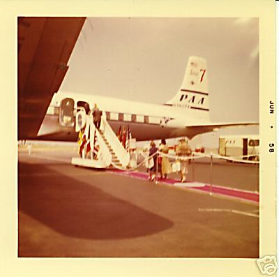 1958 A Red carpet boarding of of a Pan Am DC7.